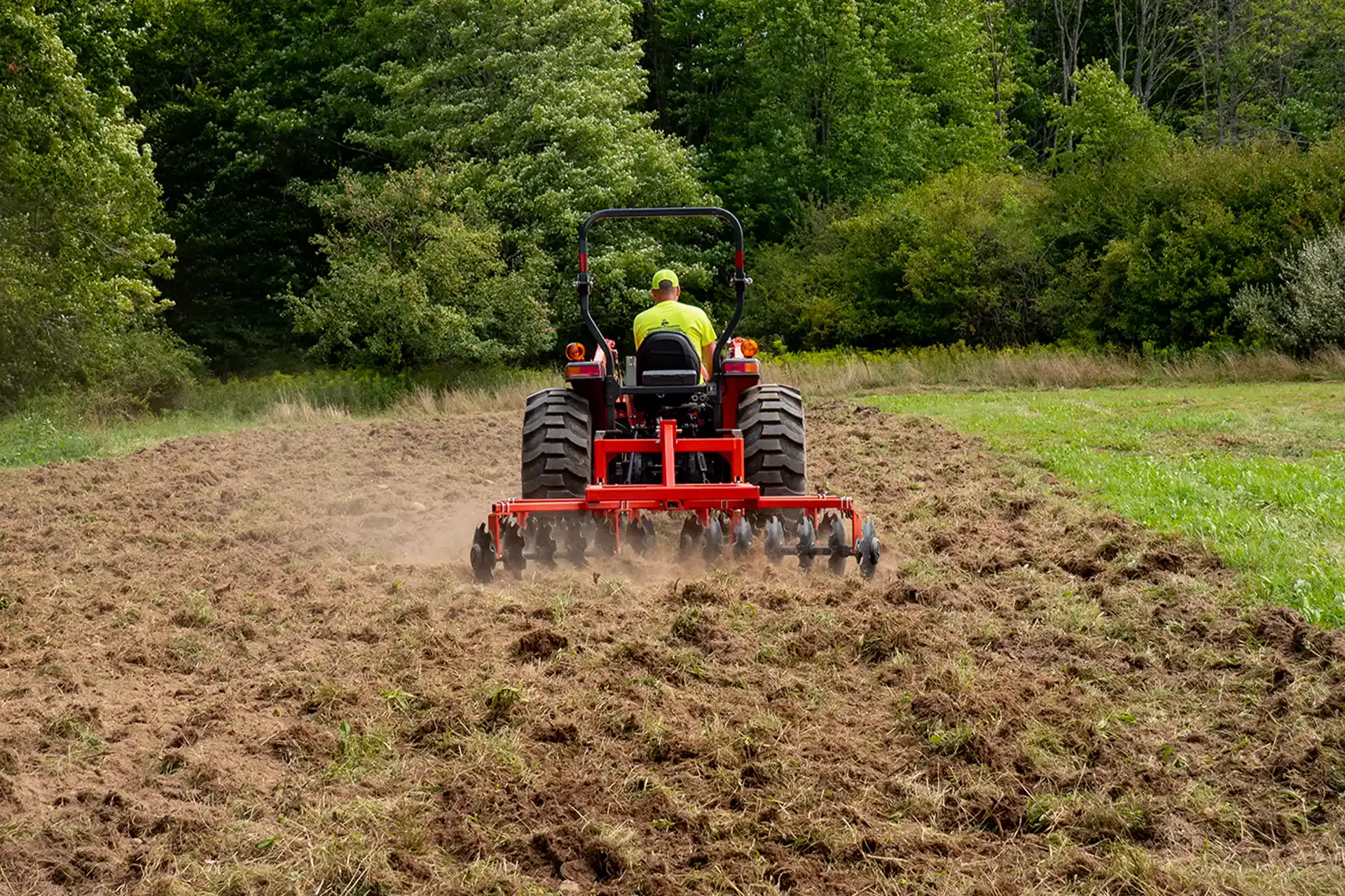 Homestead Implements Disc Harrows in Field